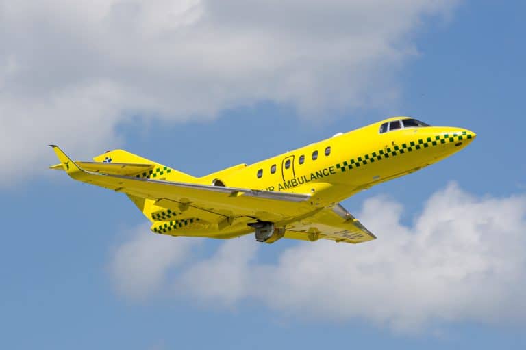 yellow air ambulance jet