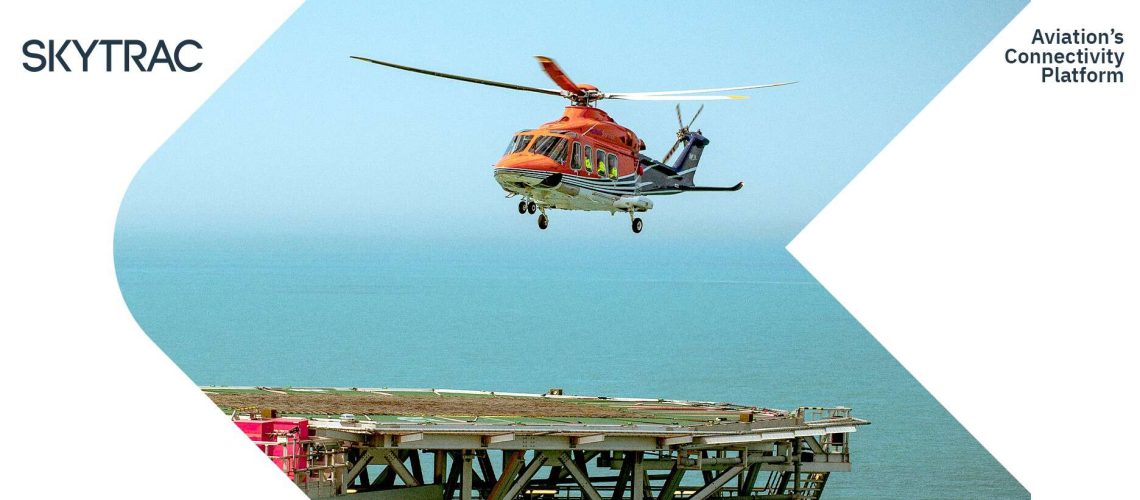 A helicopter landing on an offshore helipad.